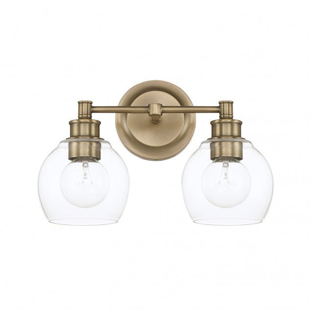 Capital Lighting Mid-Century 2-Light Vanity Light in Aged Brass with clear rounded glass shades by  121121AD-426